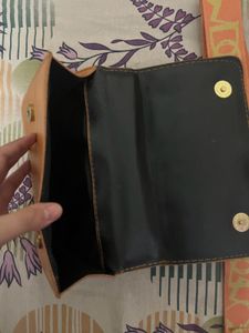 Swiss Beauty Eye Patches And Orange Quilted Bag