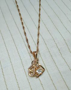 Elegant Gold-Tone Pendant Necklace