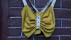 Hardly worn mustard yellow crop top .