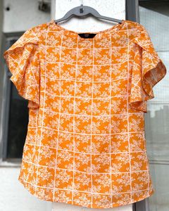 Zink Orange Floral Ruffle Top
