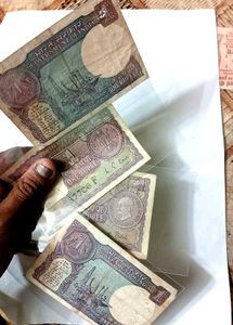 Four 1 Rs Old Denomination Note