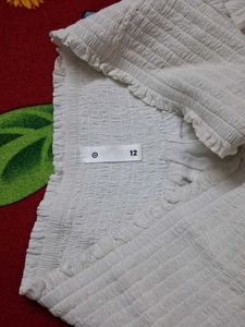 White Mini Skirt..branded