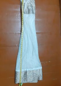 White Flared Gown With Shining Lining
