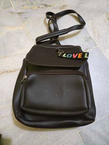 Brown Mini Backpack with Charm