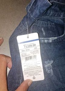 Distressed Blue Denim Jeans