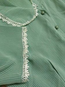 A beautiful sea green coloured crop shirt..