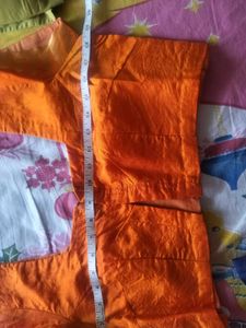 Orange Silk Saree with Gold Details