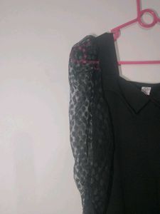 WomenMid Length Frock With Netted Puff Hand Sleeve