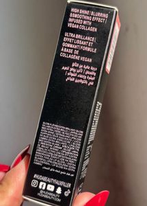 Huda Beauty FauxFiller lipgloss:- Bombshell