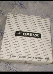 OREVA Wall Clock
