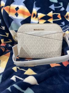 MK SLING BAG