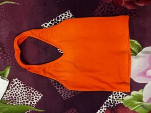 A Orange Back Less Top