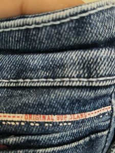 Distressed Dark Wash Denim Jeans