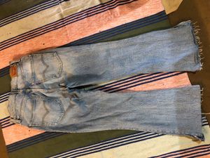 Levi’s High Rise Bootcut Raw Hem Jeans