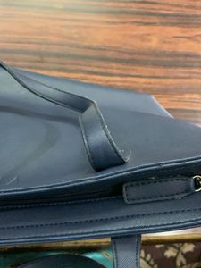 An Affordable Luxury Brand Pre Loved Tote Bag