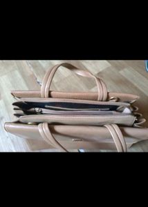 Spacious Handbag With Multiple Compartments