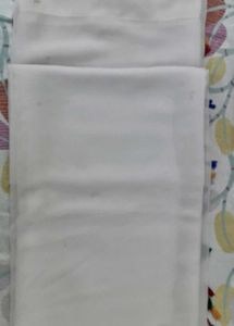 White Saree with multi coloured boarder