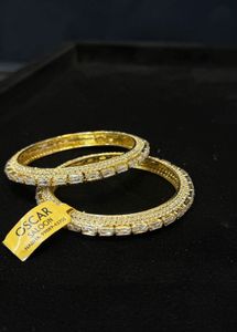 Oscar golden bangles