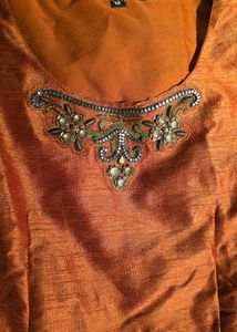 modern pulm top and dhoti along with shrug