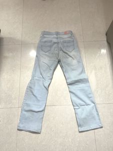 Ripped Light Wash Denim Jeans