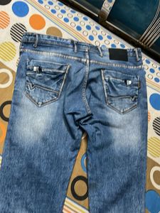 Ripped Wash Jeans