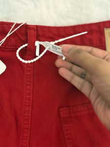 Red solid boot cut / straight Jeans