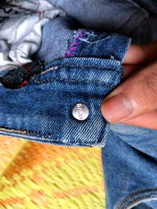 Distressed Blue Jeans