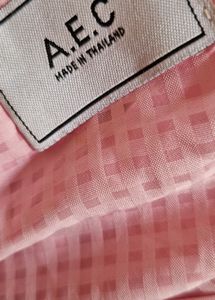 A Baby Pink Coloured Transparent Shirt.