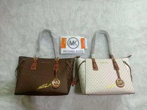 MICHAEL KORS VOYAGER TOTE BAG AT SALE