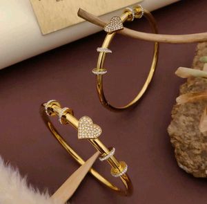 Gold Tone Flower Bangle Set