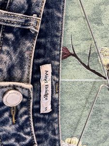 Distressed Wide Leg Denim Jeans