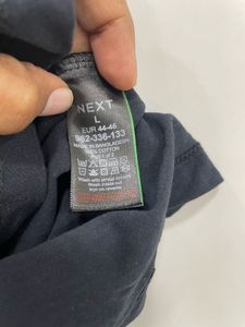 Own Your "Midnight Essential" V-Neck! 🖤✨🏙️