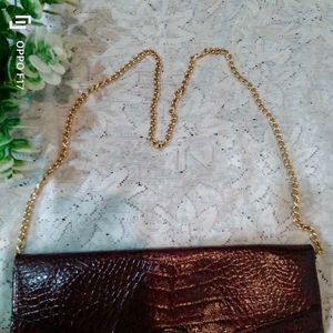 maroon vintage leather snakeprint bag