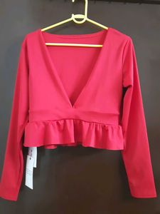 Red Ruffle Hem Long Sleeve Top