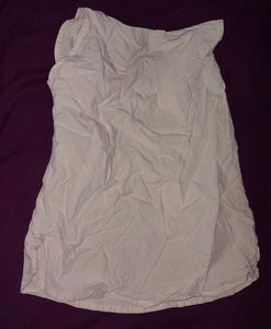 Off-White Sleeveless Blouse with Ruffled D