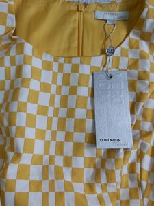 Never used white and yellow dress