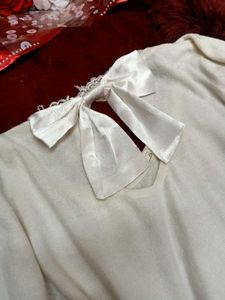 🌼Chic Ivory Back-Tie Knit Top🌼