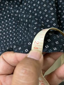 Black With Little Design On The Shirt