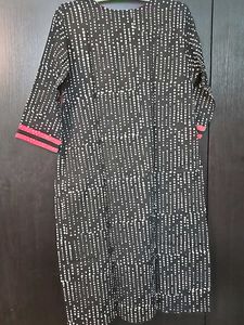 Beautiful Kurti In Black With Red Work Patches