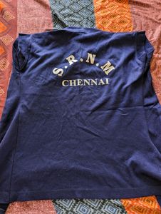 Shrug Type Top Of SRNM Chennai Logo
