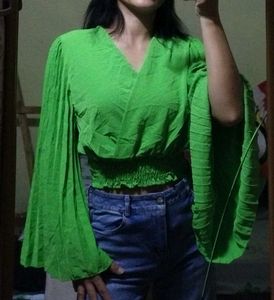 Bright green crop top.