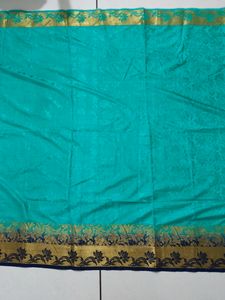 Teal And Blue Tapeta Silk Saree
