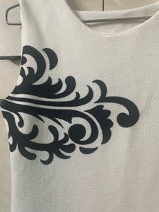 White Dress with Black Floral Detail