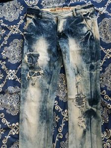 Distressed Blue Denim Jeans