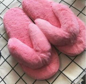 Pink indoor slipers with free black furry scalf