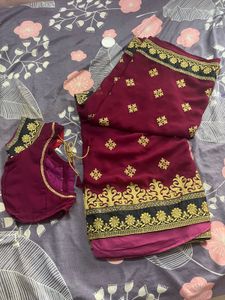 Elegant Maroon Embroidered Saree