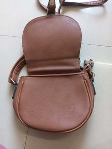 Blue and Brown sling bag