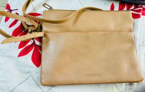 Tan Color Stitch And Hide Sling Bag