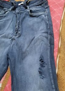 Ripped Blue Denim Jeans