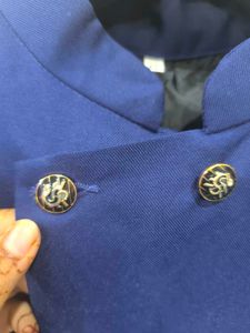 Royal blue waist coat.